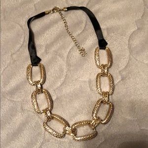 Gold and black necklace